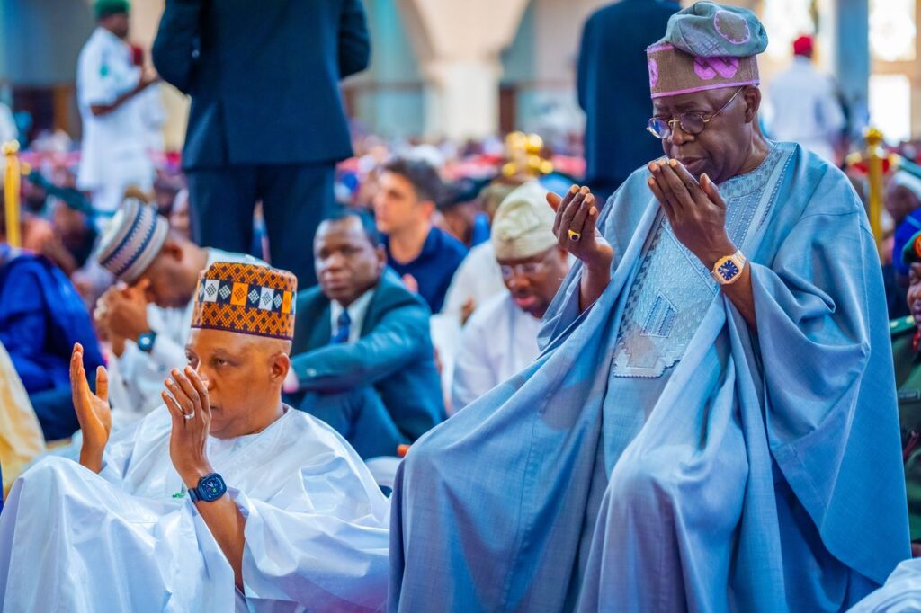 President Tinubu and Vice President Kashim Shettima with others at the National Mosque in Abuja on Friday.